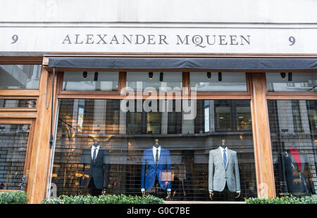 Shopfront and mannequins in the Alexander McQueen store on Old Bond Street, London, W1, England, UK Stock Photo