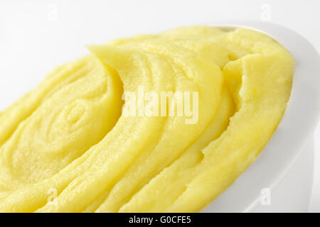 detail of mashed potato puree in white bowl Stock Photo