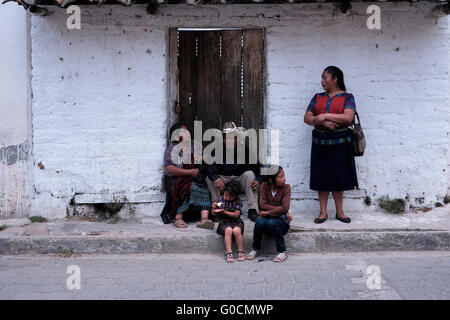 A Maya family in Chichicastenango also known as Santo Tomas Chichicastenango a town in the El Quiche department of Guatemala, known for its traditional Kiche Maya culture. Stock Photo