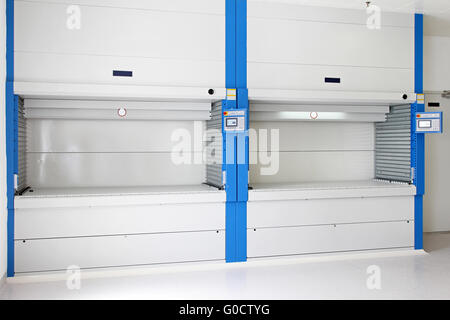 Vertical carousel space saver for storage in warehouse Stock Photo