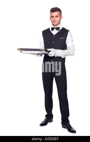 Young person in a suit holding an empty tray isolated on white background Stock Photo