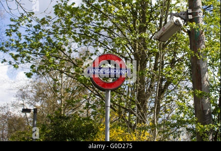 London Underground Tube sign and CCTV camera Stock Photo