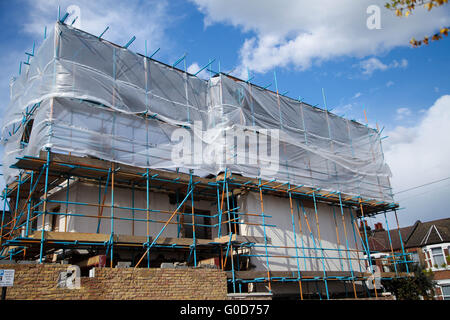 Scaffolding on a renovated house in London Stock Photo