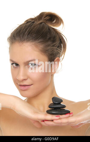 woman holding stones on the palm of your hand Stock Photo