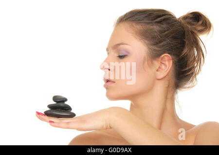 woman holding stones on the palm of your hand Stock Photo