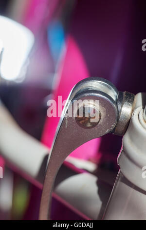 clamp bicycle saddle. close-up. White and pink Stock Photo
