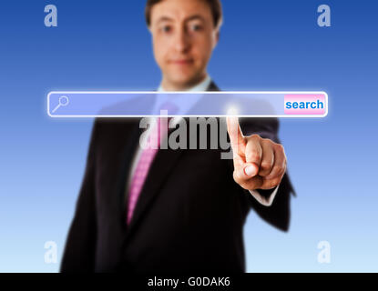 Smiling Manager Touching An Empty Search Bar Stock Photo