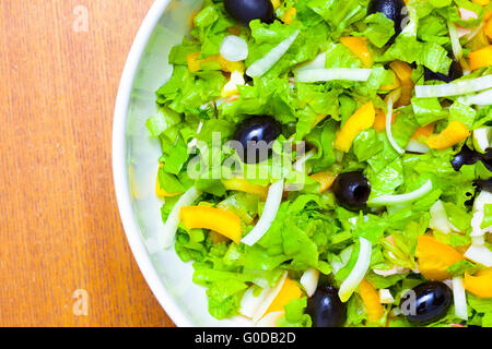 Assorted salad of green leaf lettuce with squid an Stock Photo