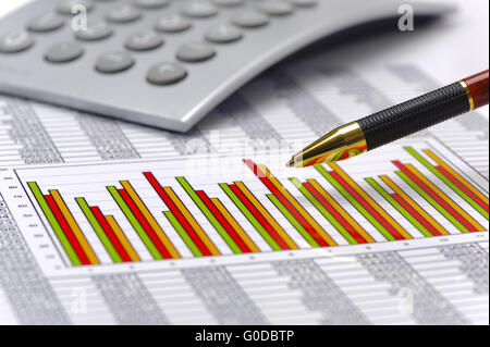 finance calculation with chart and pen Stock Photo