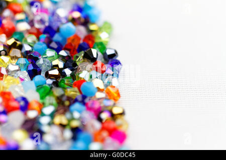 Beautiful glass beads closeup on white background Stock Photo