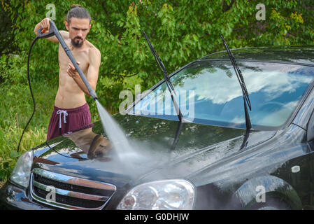 Hand washing car window Stock Photo - Alamy
