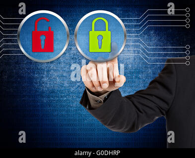 Hand pushing virtual security button Stock Photo
