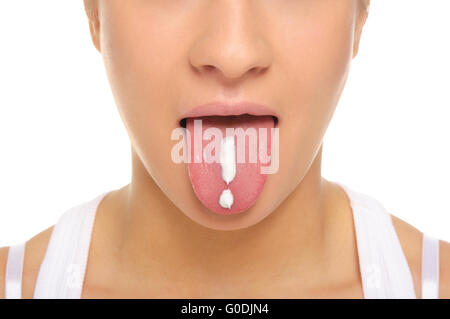 Woman puts out tongue with drawn exclamation mark Stock Photo
