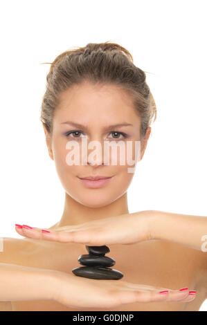 woman holding stones on the palm of your hand Stock Photo