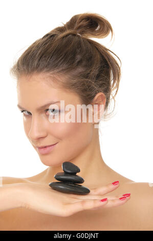 woman holding stones on the palm of your hand Stock Photo