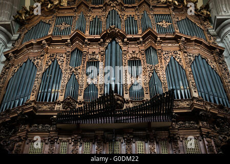 MEXICO CITY, MEXICO --One of the two pipe organs in the Metropolitan Cathedral. The cathedral houses two of the largest 18th century pipe organs in the Americas. Built in stages from 1573 to 1813, the Mexico City Metropolitan Cathedral is the largest Roman Catholic cathedral in the Americas. It sits in the heart of the historic quarter of Mexico City along one side of the the Zocalo. Stock Photo