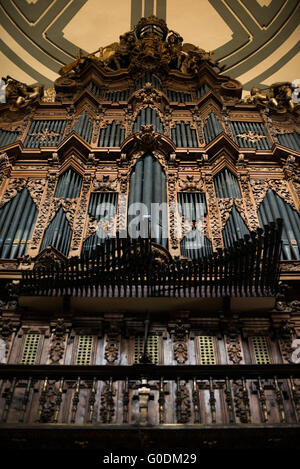 MEXICO CITY, MEXICO --One of the two pipe organs in the Metropolitan Cathedral. The cathedral houses two of the largest 18th century pipe organs in the Americas. Built in stages from 1573 to 1813, the Mexico City Metropolitan Cathedral is the largest Roman Catholic cathedral in the Americas. It sits in the heart of the historic quarter of Mexico City along one side of the the Zocalo. Stock Photo