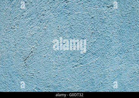 Blue painted plaster house wall closeup Stock Photo