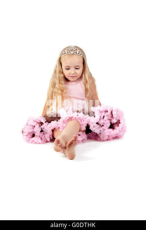 Happy little girl in pink tutu skirt and diadem Stock Photo