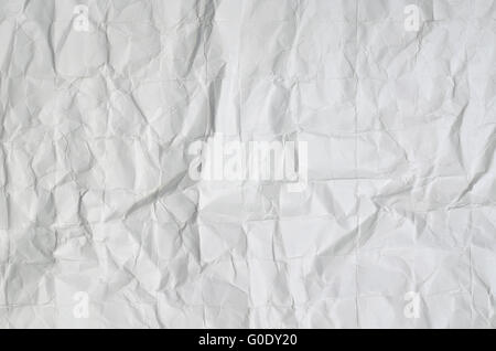 Close up of a creased, white,  paper texture, full frame, vertical, horizontal Stock Photo