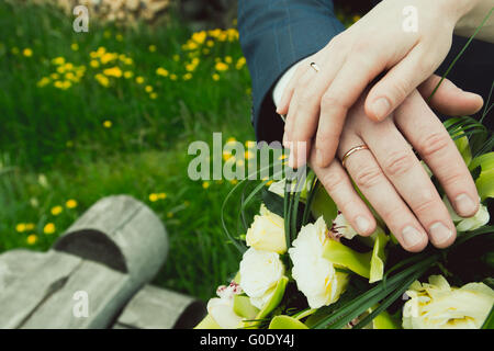 Hands with wedding rings Stock Photo