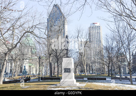 Montreal, Canada - March 27, 2016: Statue of thinker men on white sky background Stock Photo