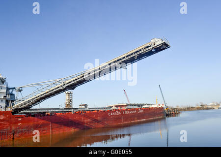 Montreal, Canada - March 27, 2016: Montreal Old Port Rusted Container Ship Stock Photo