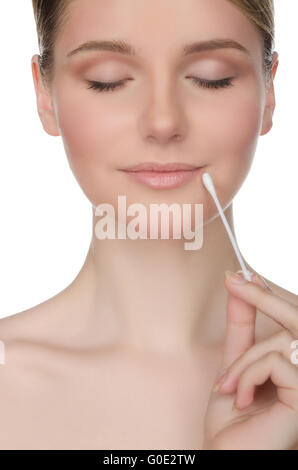 beautiful woman holding cotton swabs at mouth Stock Photo