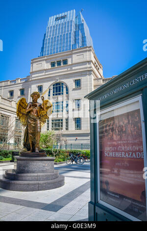 A signboard and the Recording Angel Statute in polished bronze at entrance to the Schermerhorn Symphony Center Nashville TN Stock Photo