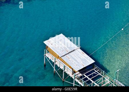 A boat dock off the shore of Sorrento Italy Stock Photo