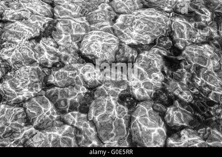 Water surface with slippery surfaces in s&w Stock Photo