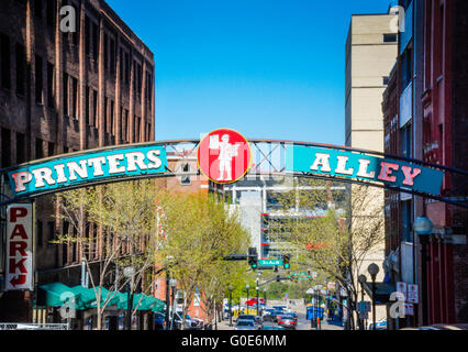 Printer's Alley sign arched across the street is an historic area for adult entertainment in downtown Nashville, TN Stock Photo