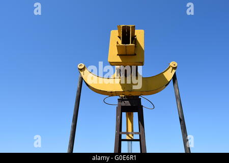 The pumping unit as the oil pump installed on a well Stock Photo