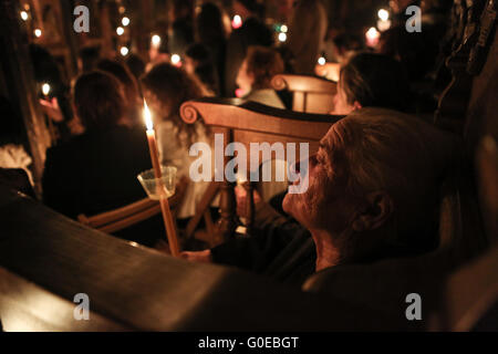 Meteora. 1st May, 2016. Candles illuminate during the Easter mass at a monastery of Meteora in central Greece on May 1, 2016. Orthodox Christians across the world celebrate the resurrection of Jesus Christ on May 1 this year. © Lefteris Partsalis/Xinhua/Alamy Live News Stock Photo