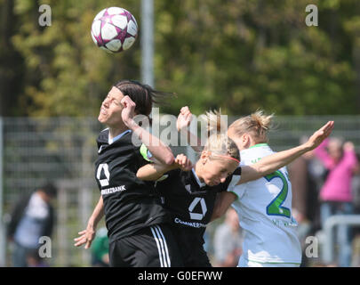 Frankfurt's Kerstin Garefrekes (L) and Kathrin-Julia Hendrich (C) in action against Wolfburg's Luisa Wensing (R) during the women's UEFA Champions League semi final second leg soccer match between 1. FFC Frankfurt and VfL Wolfsburg at the Stadion am Brentanobad in Frankfurt am Main, Germany, 01 May 2016. Photo: FRANK RUMPENHORST/dpa Stock Photo