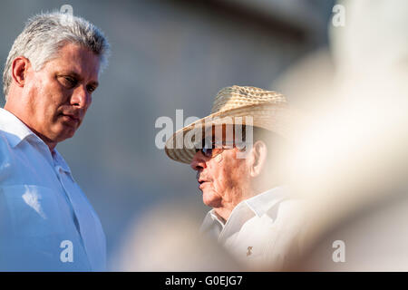 Havana, Cuba. 1st May, 2016. Cuban leader Raul Castro (R) talks with the First Vice President of Cuba Miguel Diaz-Canel while watching the parade in Revolutionary Square in Havana, Cuba, on May 1, 2016. More the 500,000 locals and foreigners took part in Cuba's International Workers' Day parade here on Sunday, also celebrating the 90th birthday of Cuban revolutionary leader Fidel Castro. © Liu Bin/Xinhua/Alamy Live News Stock Photo