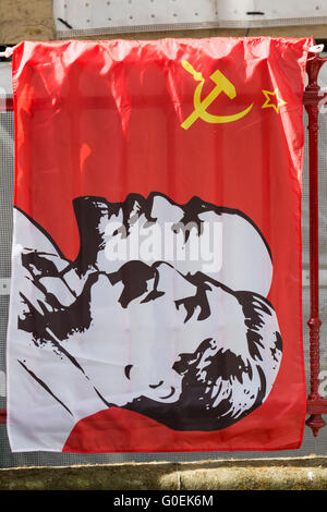 London, UK. 1 May 2016. A Lenin-Stalin flag with hammer and sickle. May Day rally in London. Credit:  Vibrant Pictures/Alamy Live News Stock Photo
