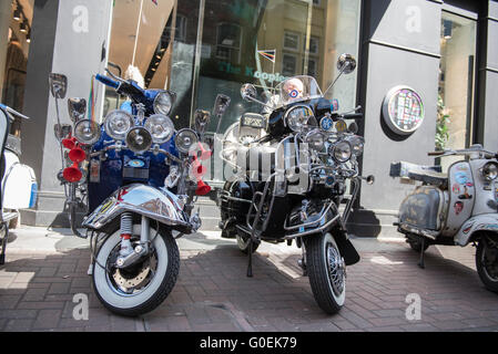 London, UK. 1st May 2016. Scooters gathered in Carnaby Street, London for the annual Buckingham Palace Scooter Run Credit:  Peter Manning/Alamy Live News Stock Photo
