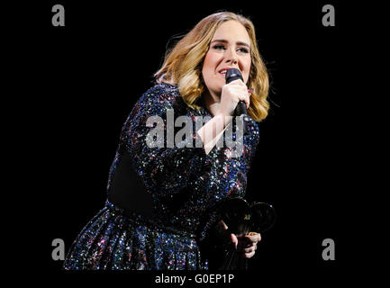 Adele wins an award whilst on stage in Birmingham as she wraps her UK tour. Adele was presented the iHeartRadio music awards gong for best song and gave an acceptance speech mid concert at the Genting Arena in Birmingham as she wraps her UK Tour this week.  Featuring: Adele Adkins Where: Birmingham, United Kingdom When: 30 Mar 2016 Stock Photo