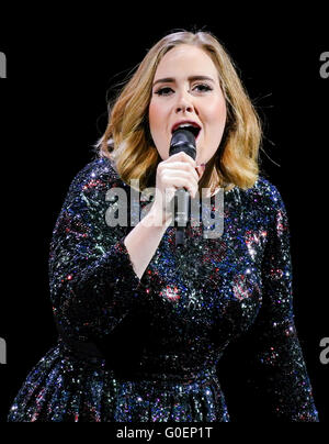 Adele wins an award whilst on stage in Birmingham as she wraps her UK tour. Adele was presented the iHeartRadio music awards gong for best song and gave an acceptance speech mid concert at the Genting Arena in Birmingham as she wraps her UK Tour this week.  Featuring: Adele Adkins Where: Birmingham, United Kingdom When: 30 Mar 2016 Stock Photo