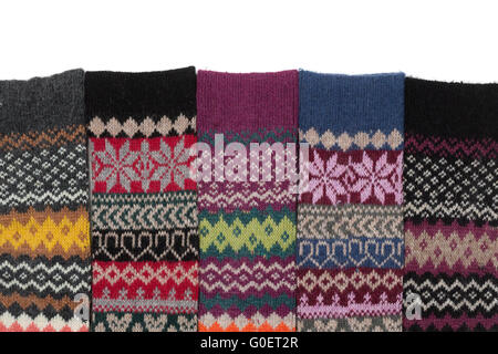 Warm woolen socks knitted with national winter pattern Stock Photo