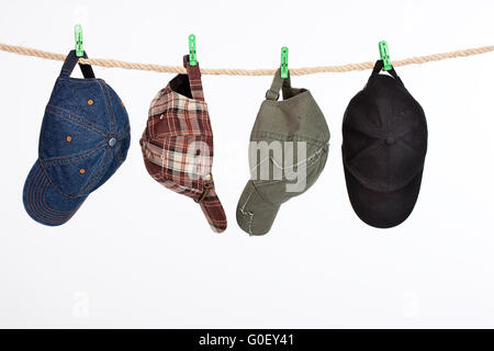 Four Caps On A Clothesline Stock Photo
