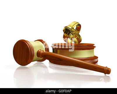 Divorce Concept Gavel and Wedding Bands Stock Photo
