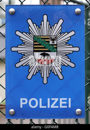 sign on a fence of a police station in Magdeburg Stock Photo