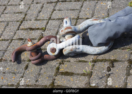 Three shackles and a hook Stock Photo