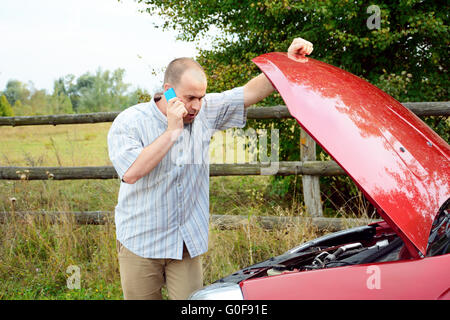 Adult man is calling to support Stock Photo