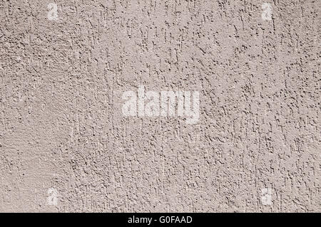 Plastered and painted facade surface of house wall Stock Photo