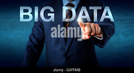Manager Selecting BIG DATA On A Screen Stock Photo
