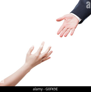 Businessman giving hand to begging needy person Stock Photo