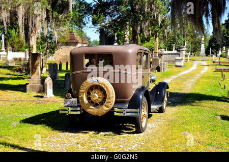 New Bern, NC:  Vintage 1929 Model A Ford sightseeing vehicle taking visitors for a tour of historic Cedar Grove Cemetery * Stock Photo